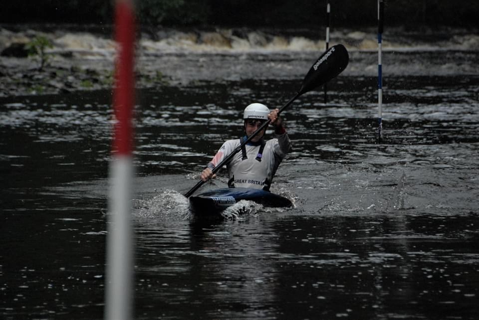 Eddie competing in canoe slalom